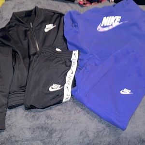 2 gently used Girl Nike jogging suit size Xl and L